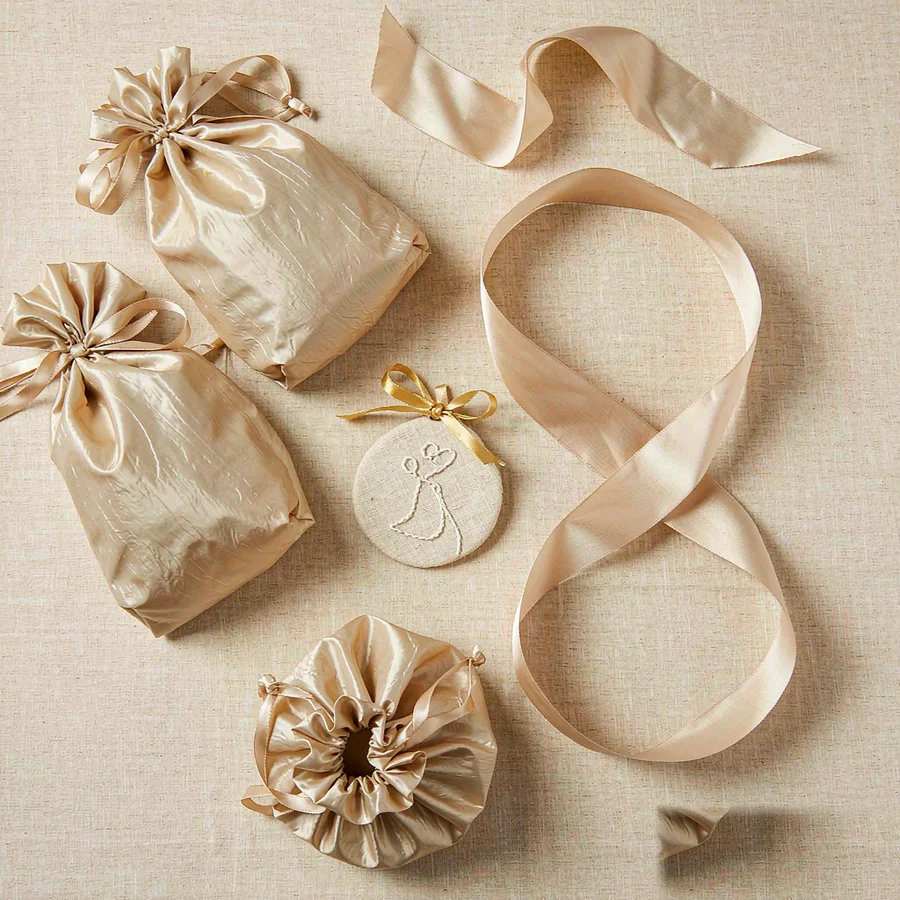 Champagne satin sash and gift pouches