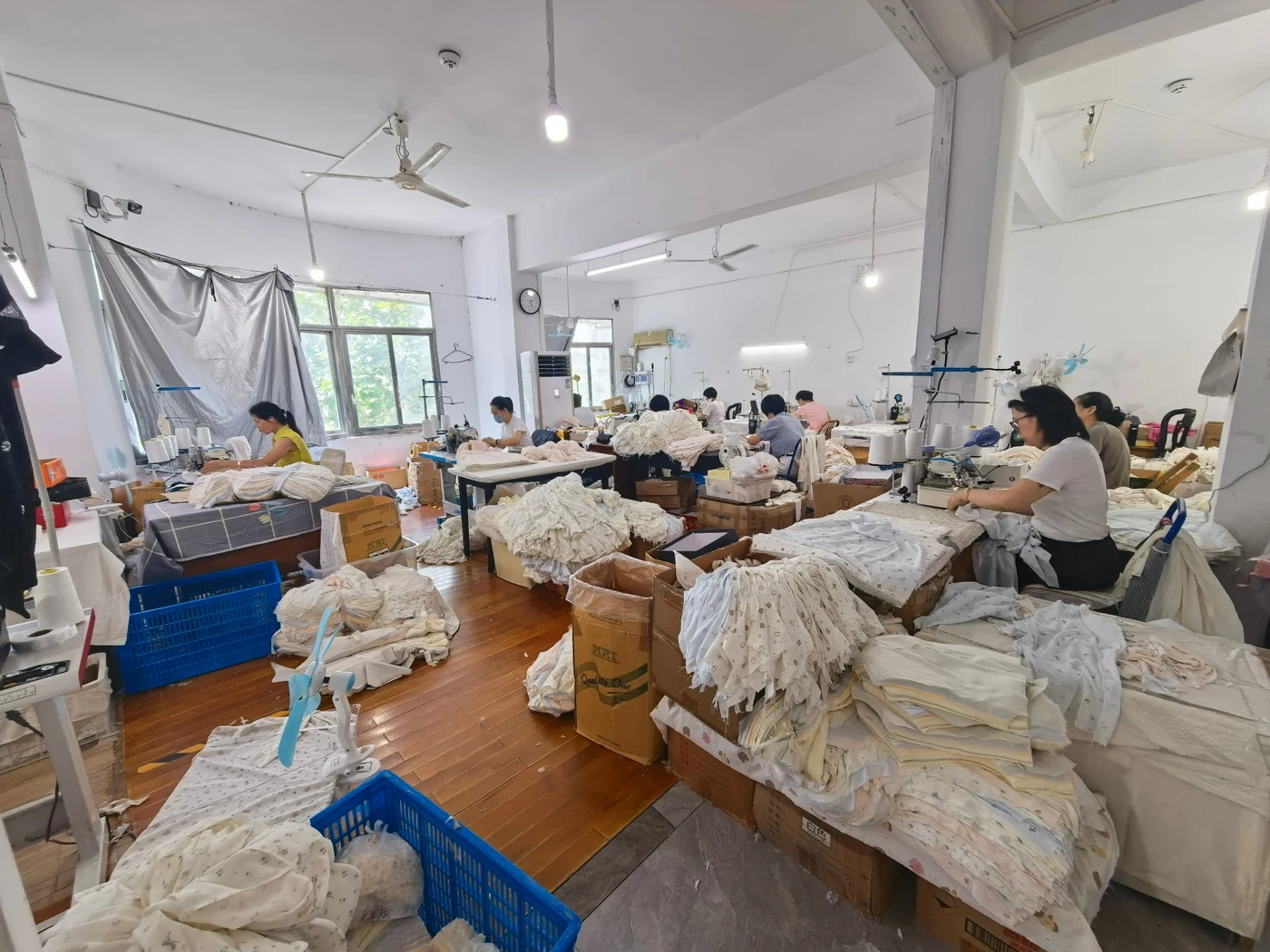 Inside the Yution sewing workshop with production lines at work