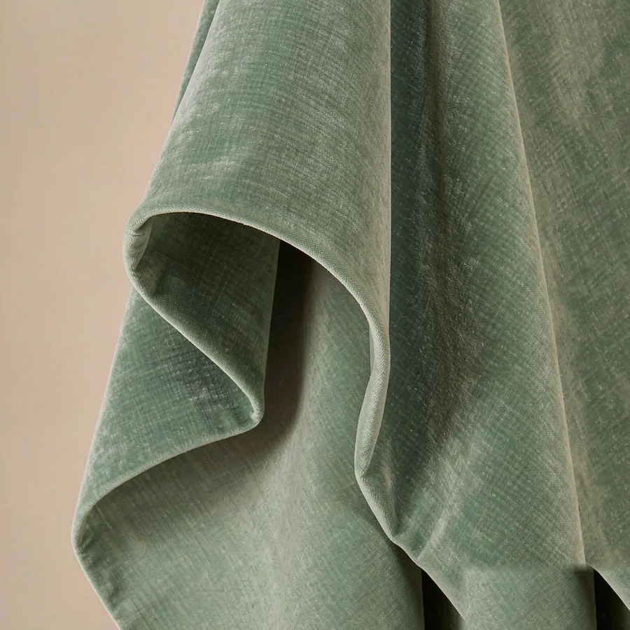 Sage green velvet fabric with deep pile